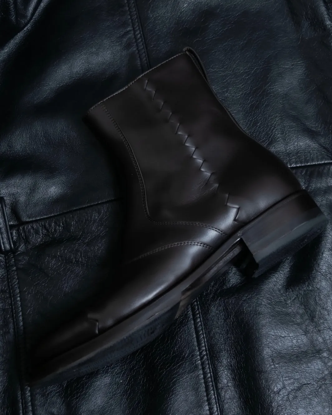 BOTTEGA VENETA round toe intrecciato leather boots