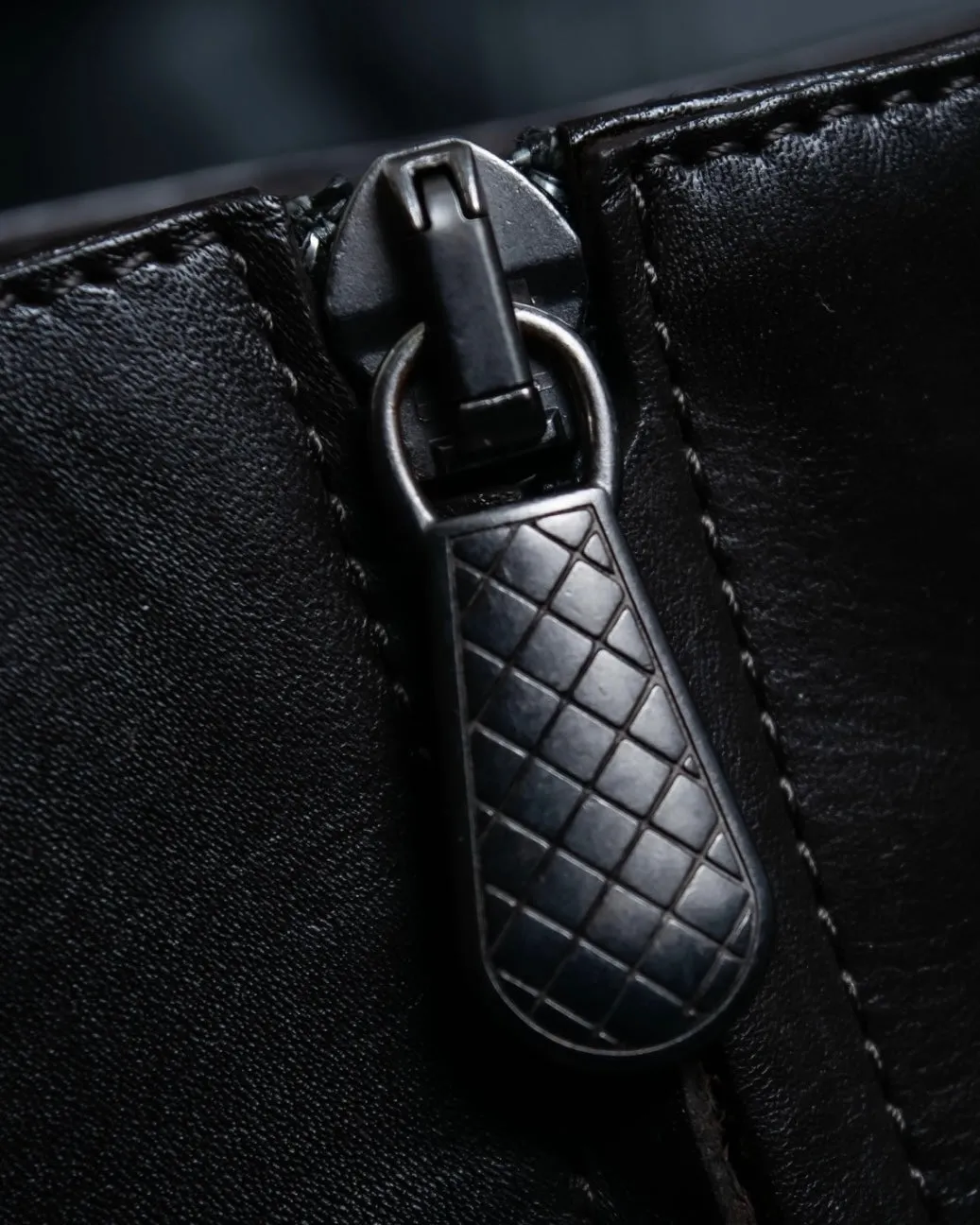 BOTTEGA VENETA round toe intrecciato leather boots